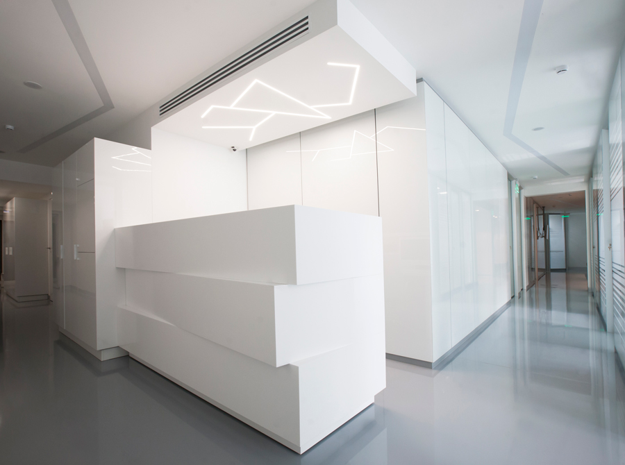 Photo Futuristic patterns and shiny accents: NAYADA for the dental center interior